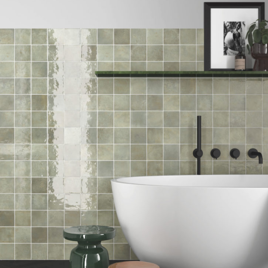 Green Zellige effect tiles on an interior wall