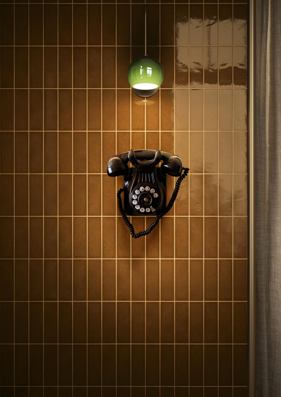 Interior wall finished with Quintessenza Amarcord Tabacco glossy porcelain tiles