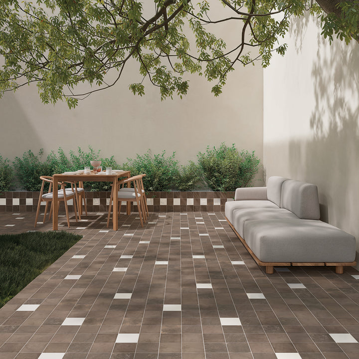 WOW Terre Umber porcelain floor tiles in an outdoor living space