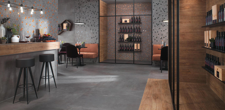 Boost Smoke concrete effect porcelain tiles in a bar interior