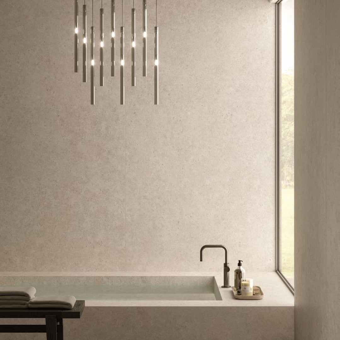 Boost Stone Taupe stone-effect porcelain floor tile in a spa bathroom