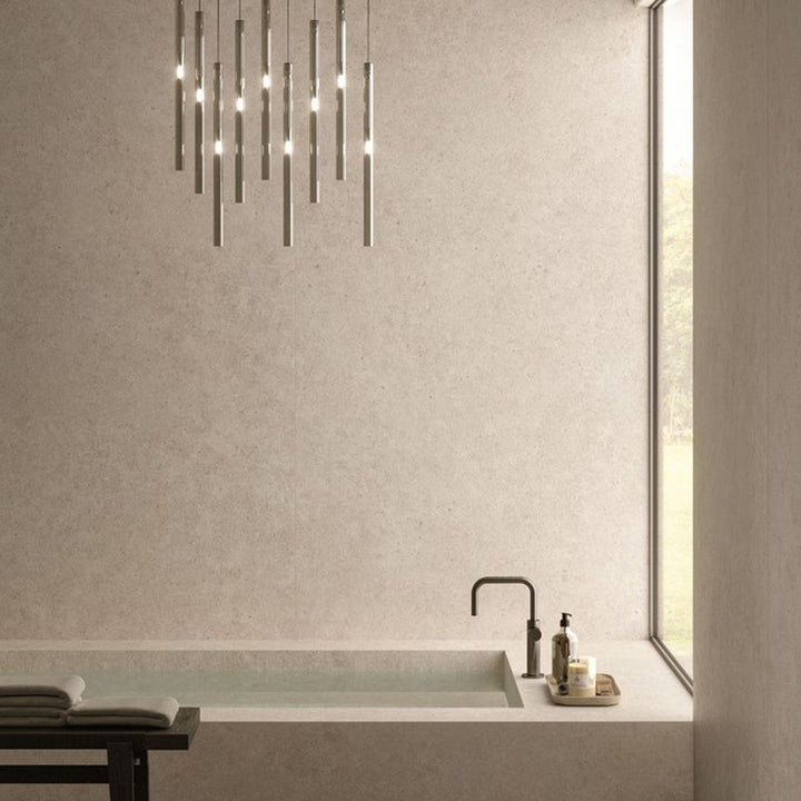 Boost Stone Taupe stone-effect porcelain floor tile in a spa bathroom