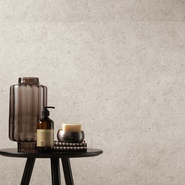 Boost Stone White stone-effect porcelain wall and floor tile in a residential bathroom