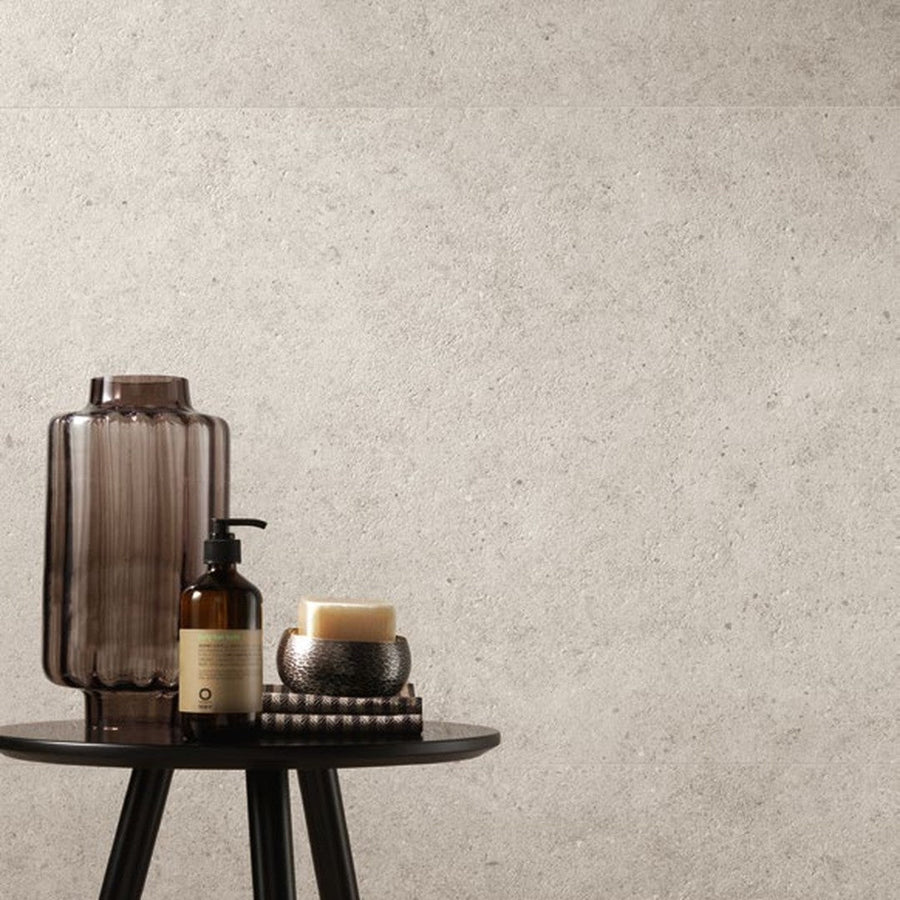 Boost Stone White stone-effect porcelain wall and floor tile in a residential bathroom