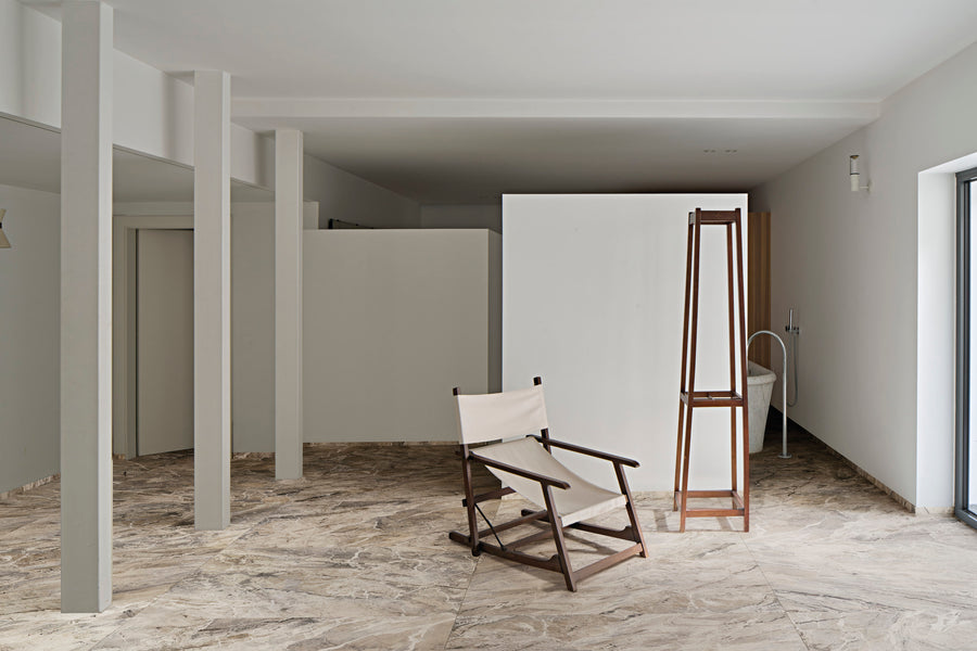 Fiandre Lexicon Breccia Blu porcelain tiles in a room setting