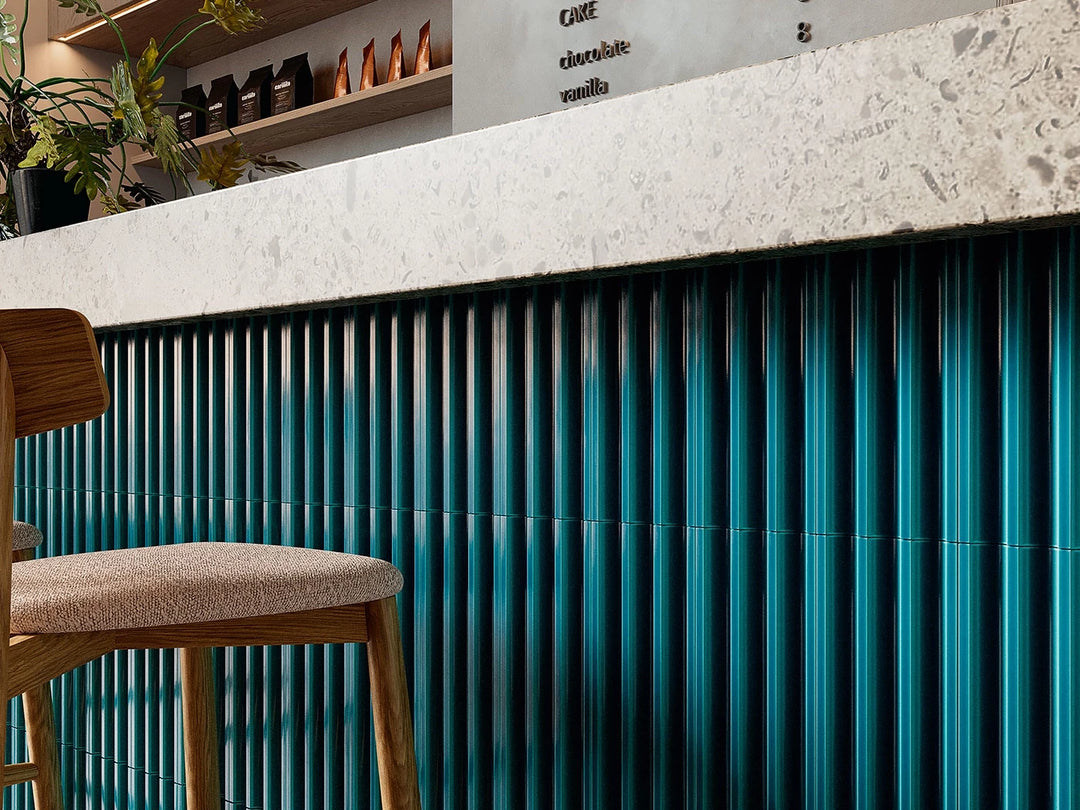 Plinth Deep Teal 3D ceramic wall tile shown in a room setting