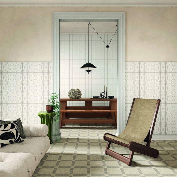 Sartoria Riflessi Luce porcelain tiles in a dining room setting