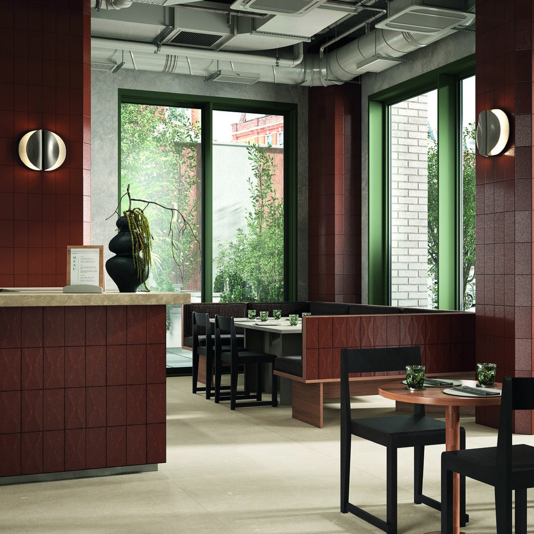 Sartoria Riflessi Tabacco porcelain tiles in a restaurant setting